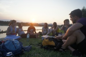 VISU members enjoy conversation at sunset along the old Danube.  (Photo courtesy of Greg Lusk)