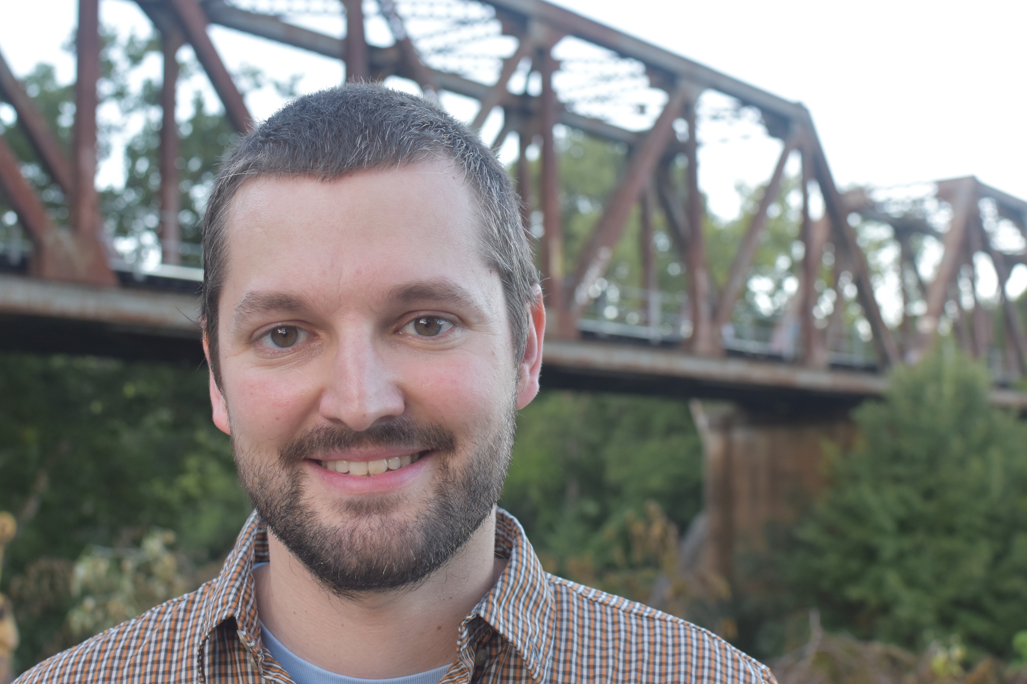 Ed Baggs in front of bridge