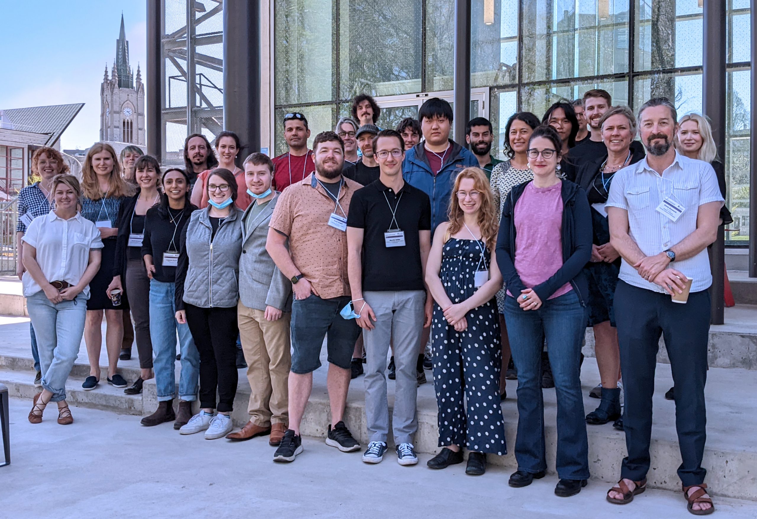 Group photo of RGSC2022 conference attendees on patio behind WIRB